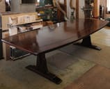 braced arch dining table in walnut